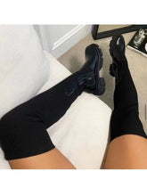 Botas altas hasta el muslo con plataforma de punto acanalado